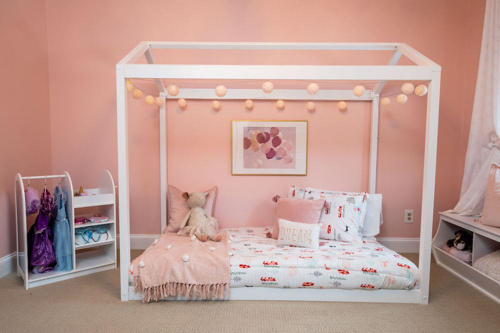 Pink girl's room with low bed