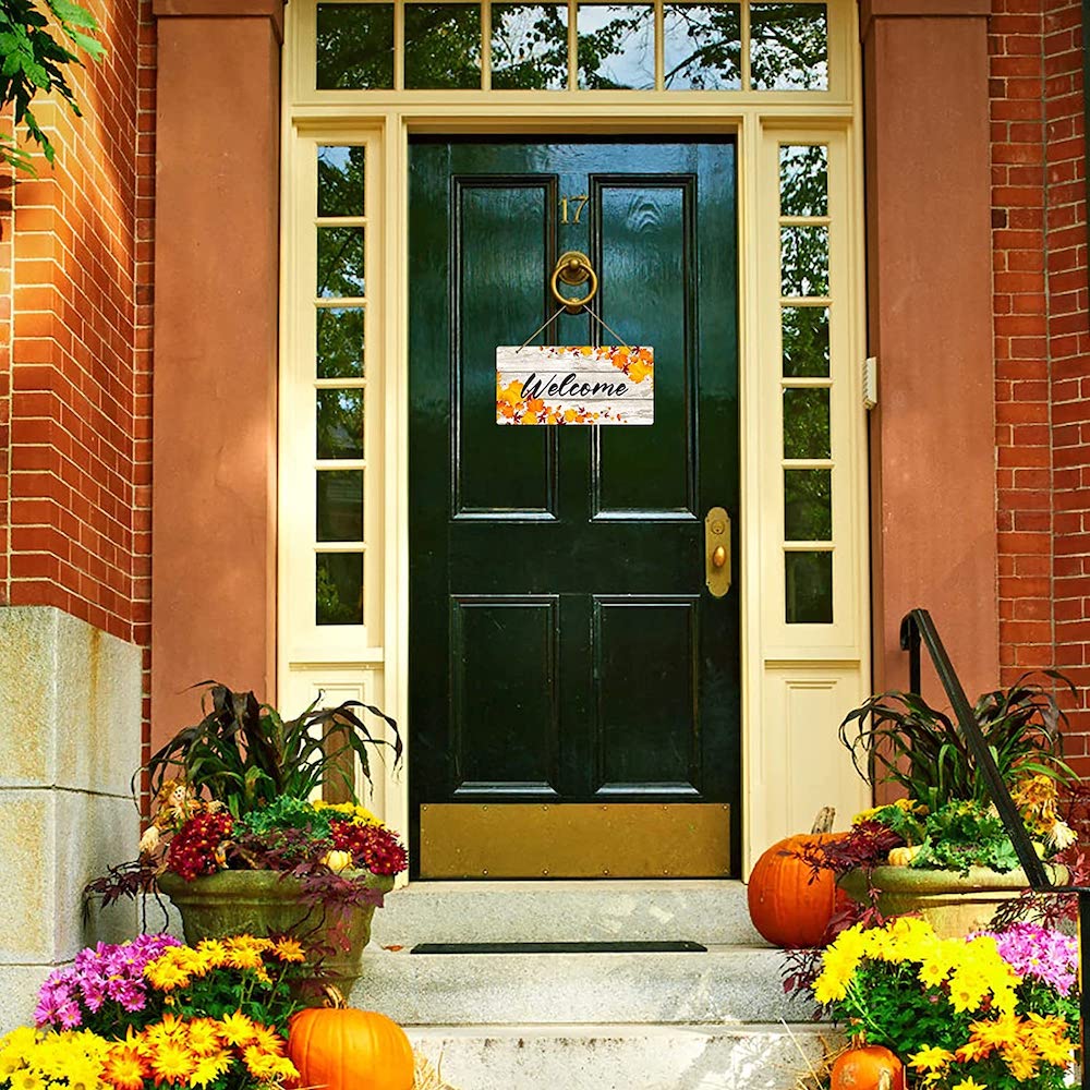 front door with fall sign