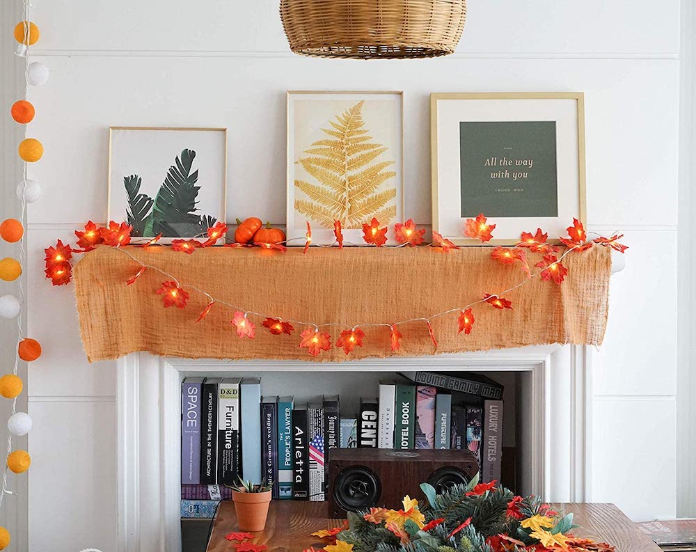 fireplace mantel with leaf-shaped garland