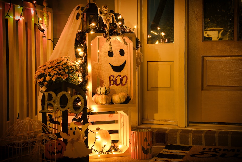 front porch with Halloween-themed decorations