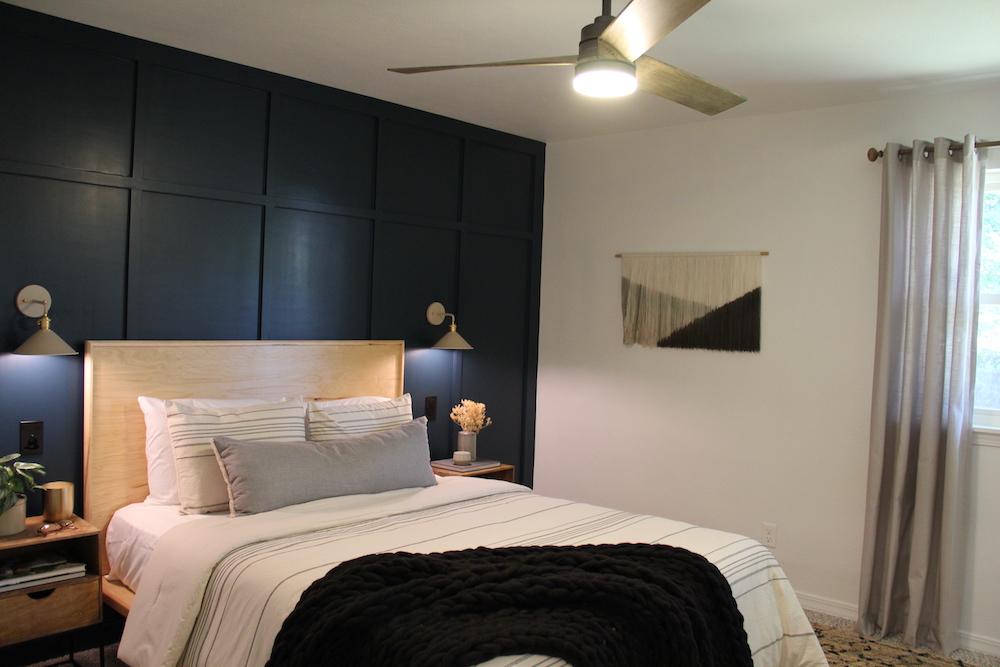 master bedroom with blue feature wall