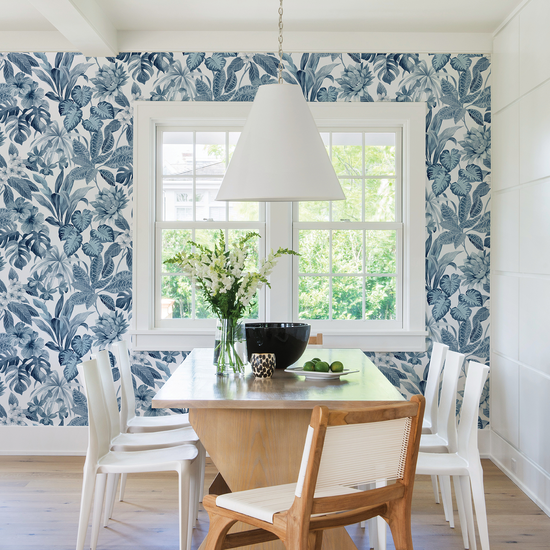 Blue tropical wallpaper in dining room