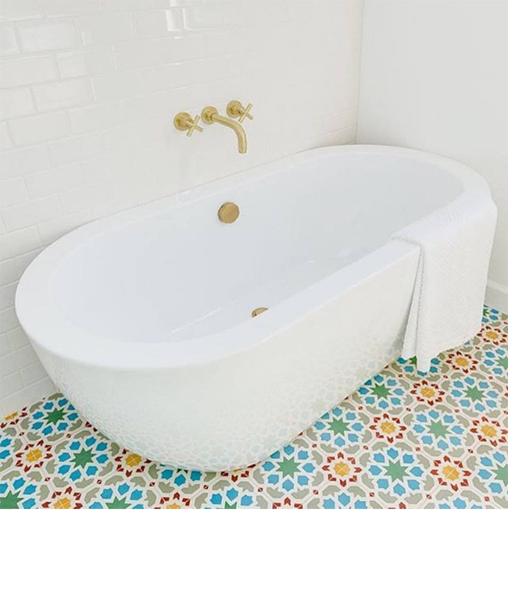 Colourful encaustic bathroom floor tile.