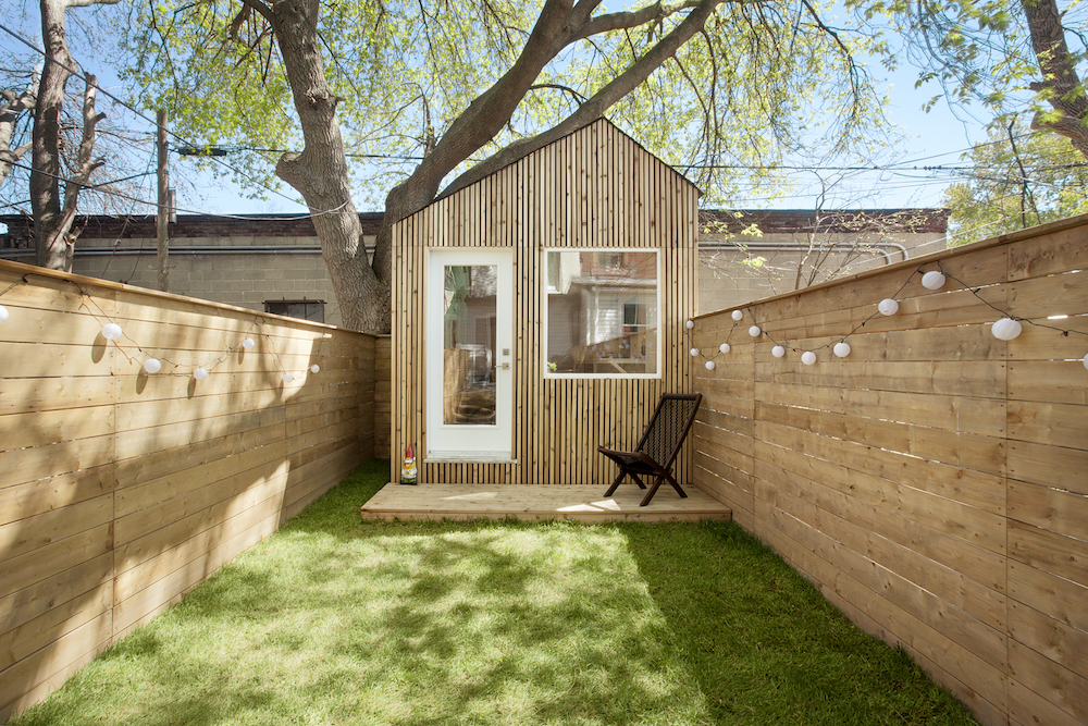 A wooden backyard office