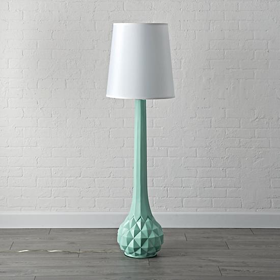 floor lamp with mint-green sculptural base and white shade