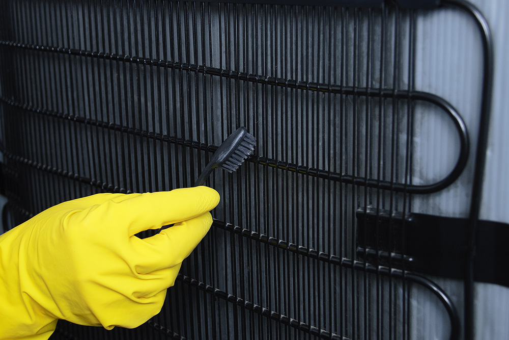Cleaning condenser coils