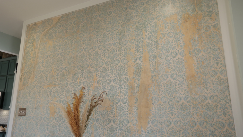 distressed wallpaper feature wall