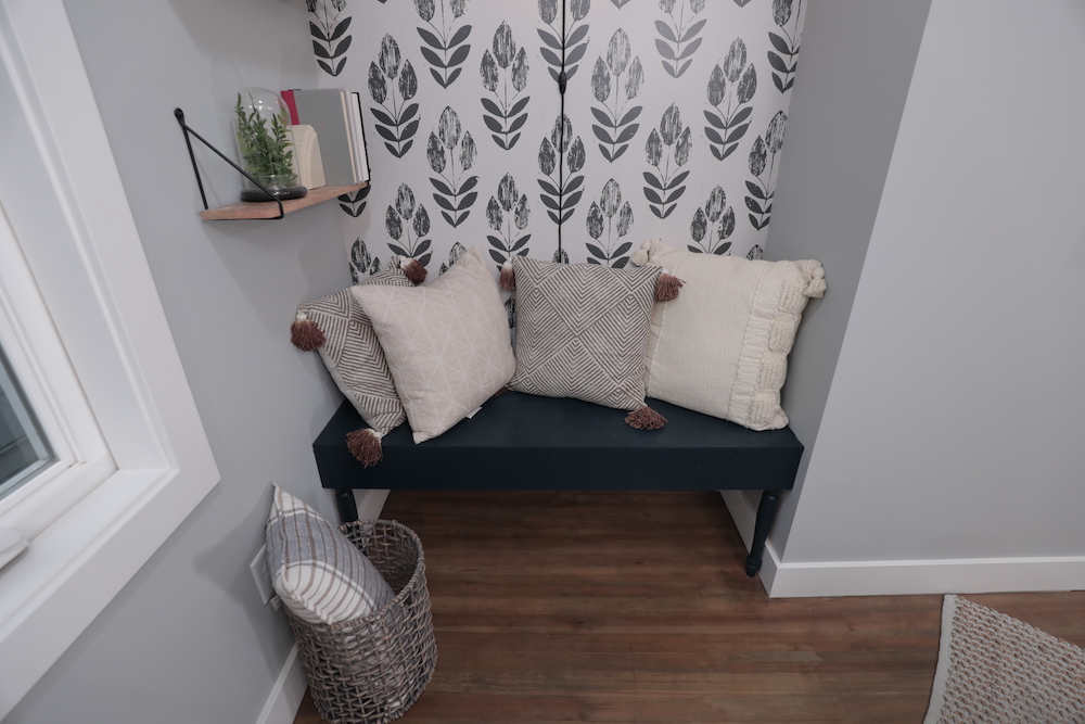 bench with pillows in nook in bedroom