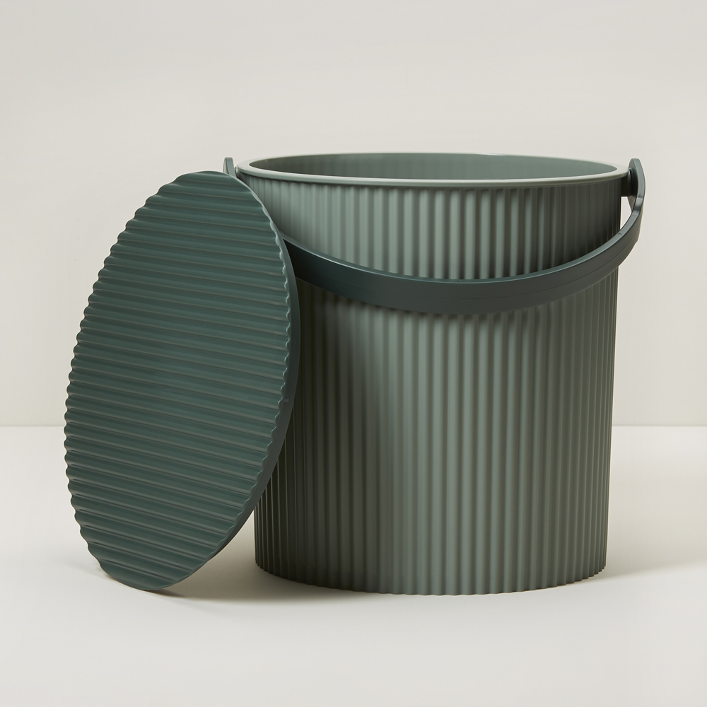 The Omnioutil Bucket by Hachiman is sold at Indigo and can be used as a compost bin