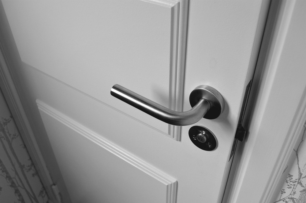 A steel doorknob in a home