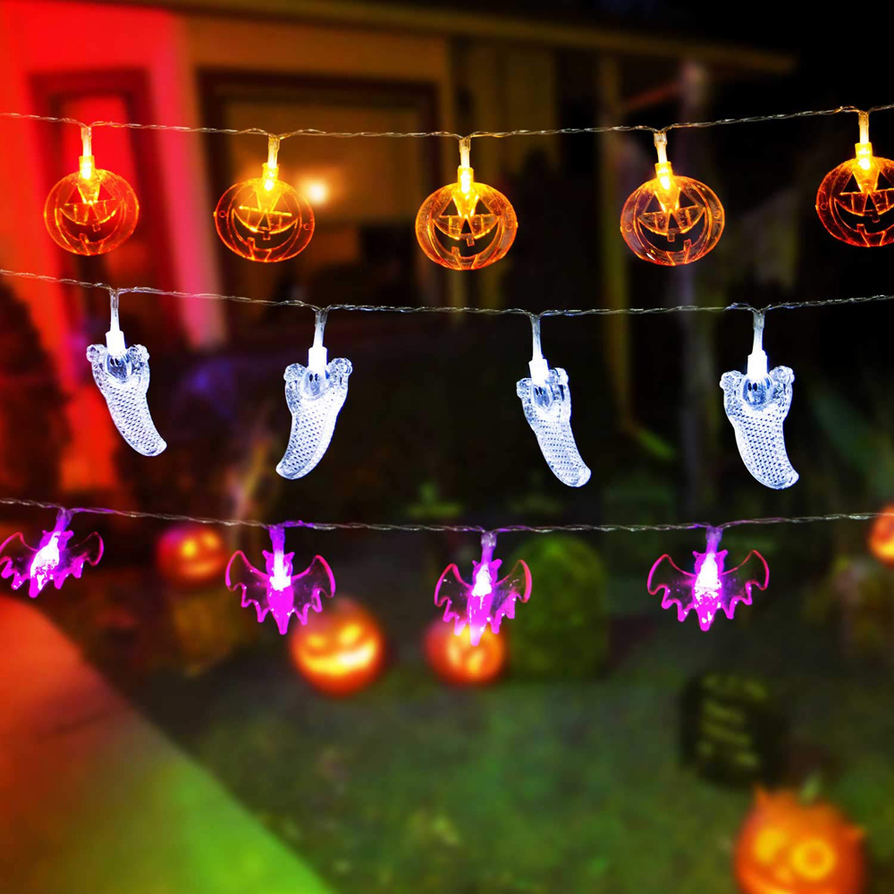 A set of three string lights for Halloween featuring bats, ghosts and pumpkins