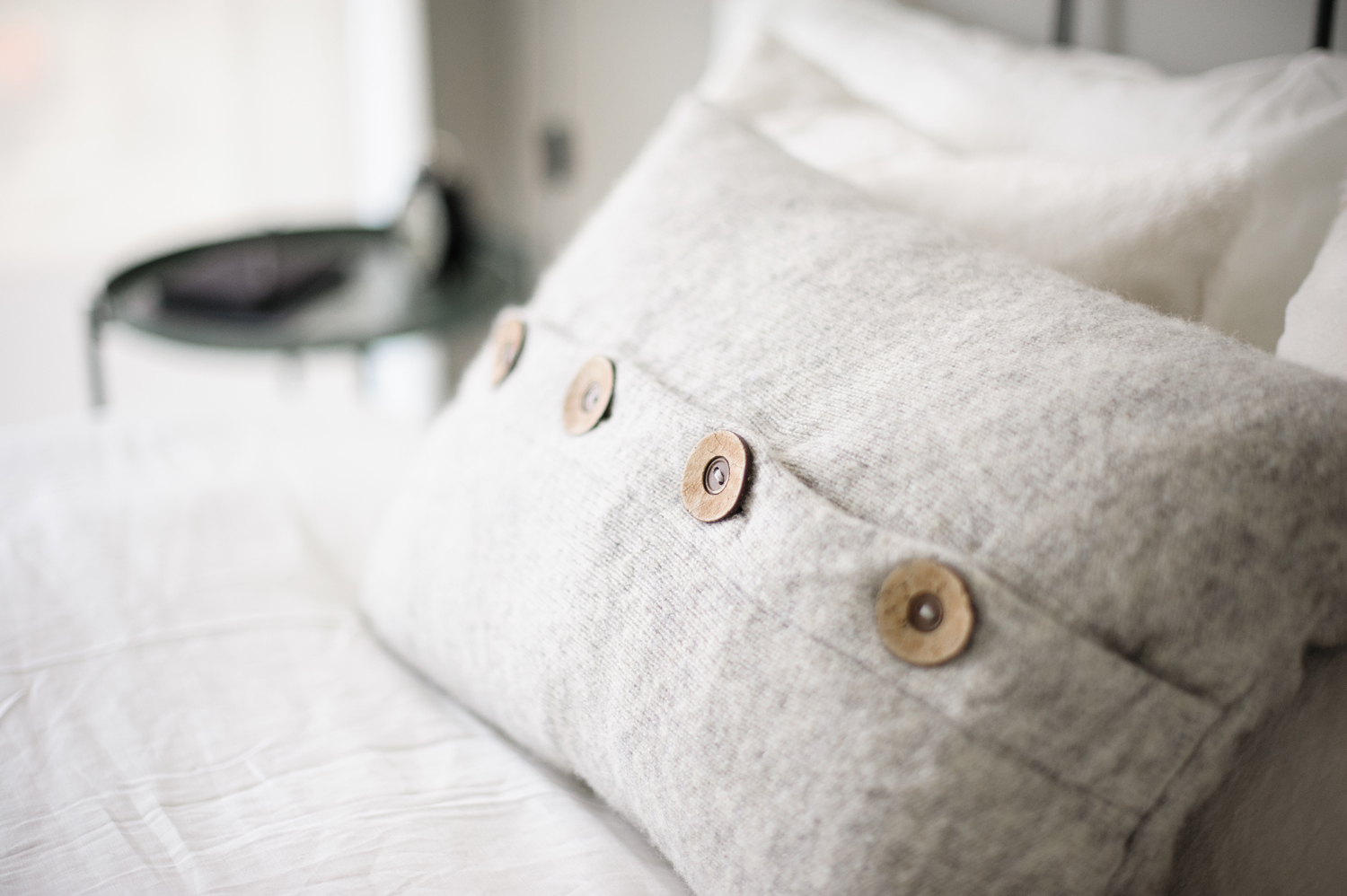 Pillow with button embellishments