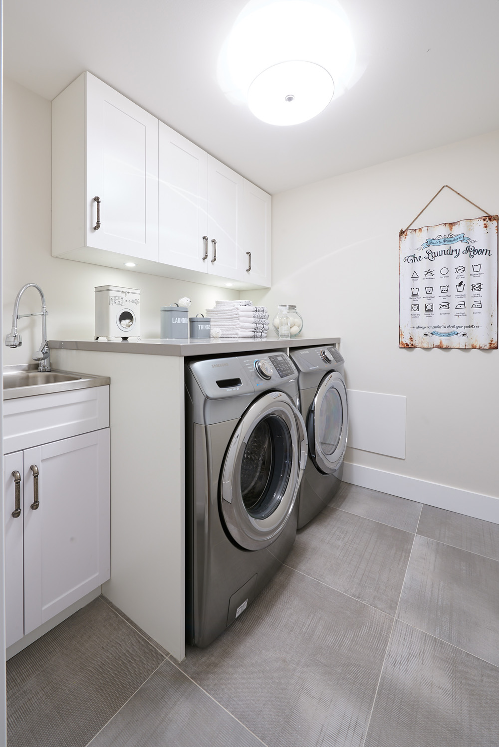 All-white laundry room design.