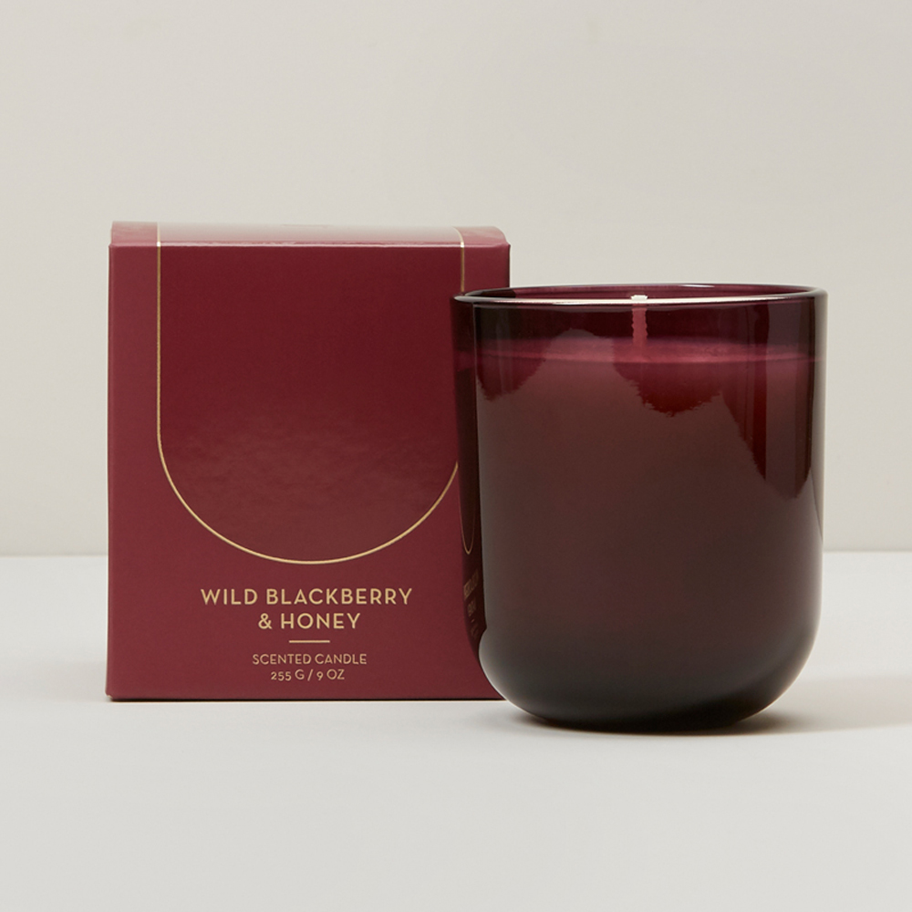 a red wild honey and blackberry scented candle from Indigo