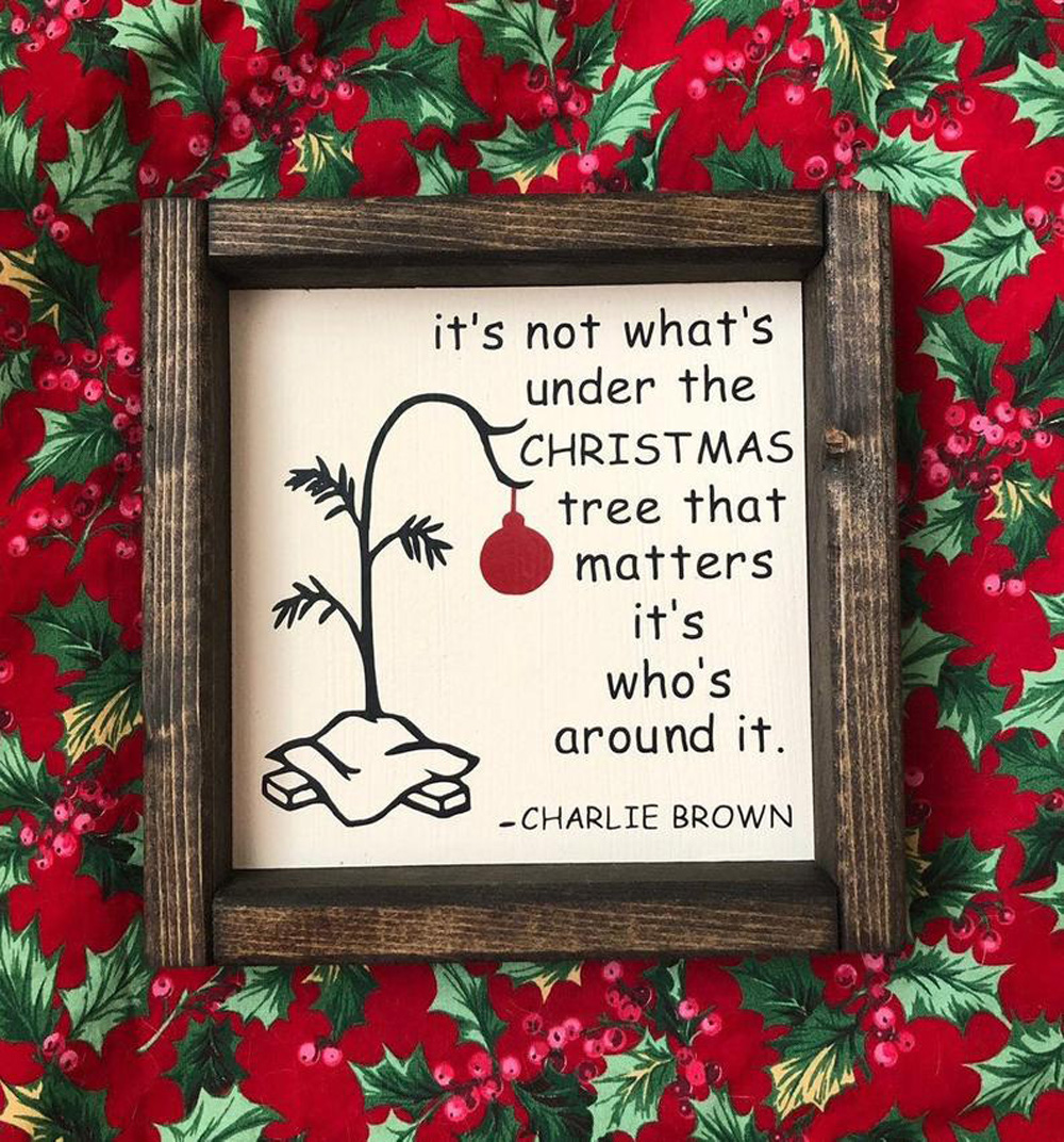 A handmade sign with a quote from Peanuts' A Charlie Brown Christmas