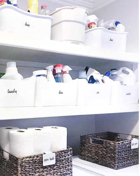 Various organized baskets in a sparkling clean laundry room