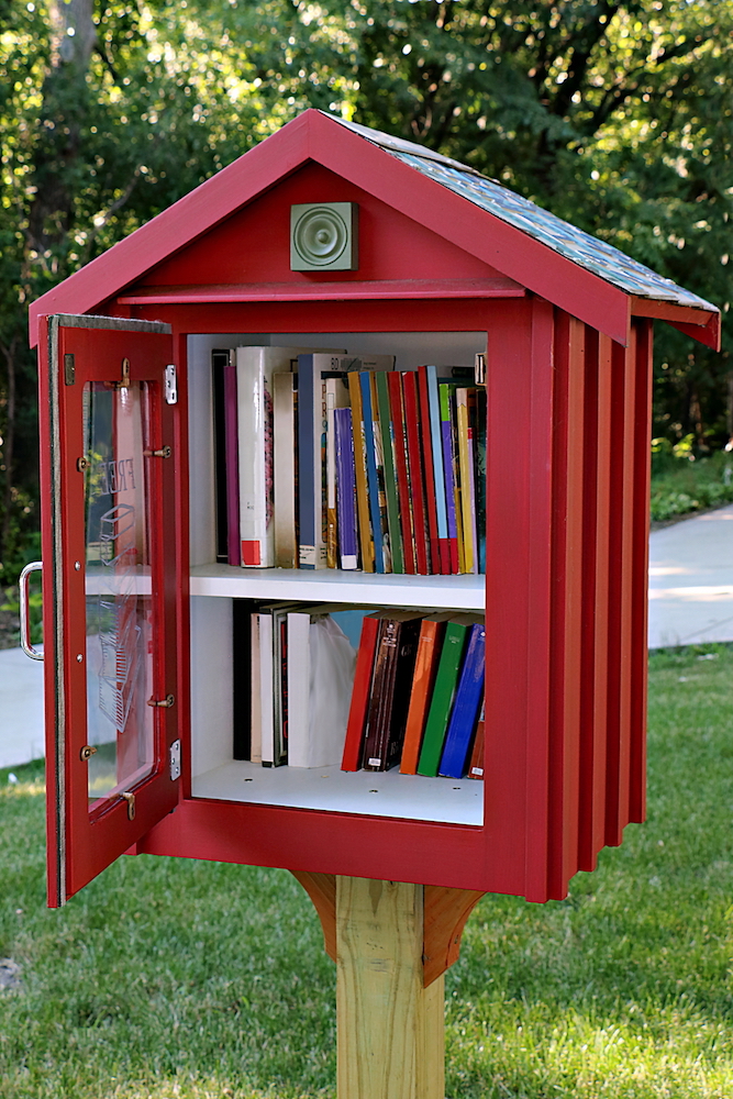 red sidewalk library in residential neighborhood