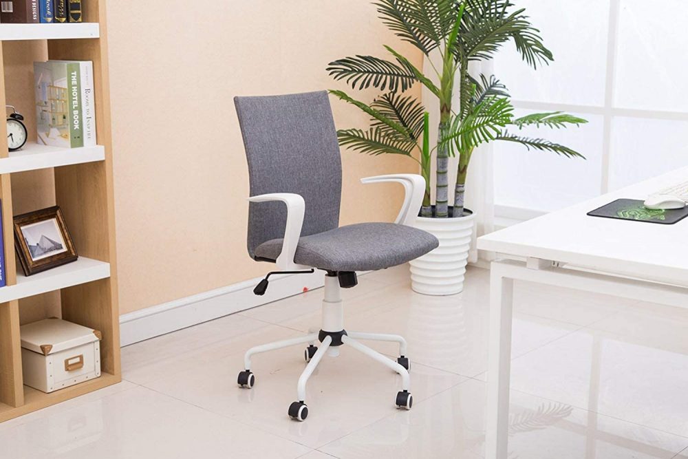 grey and white ergonomic desk chair in clean home office with white desk