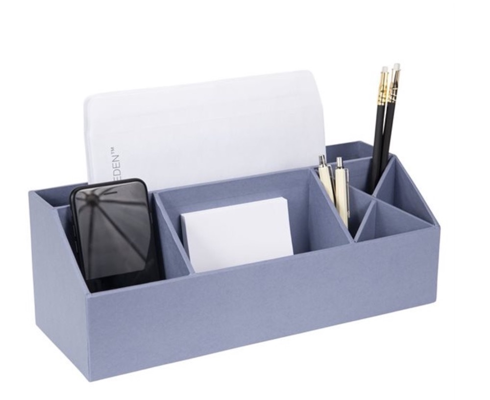 dusty blue multi-compartment desk organizer with phone, paper and pens