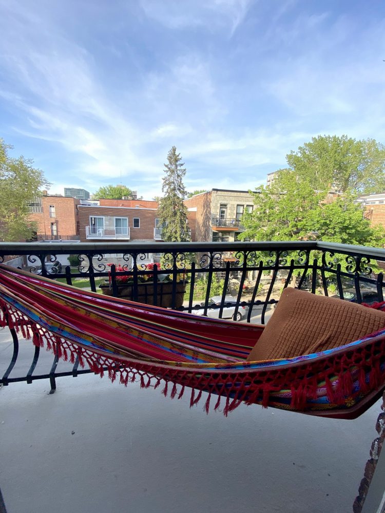 colourful hammock on patio looking over street