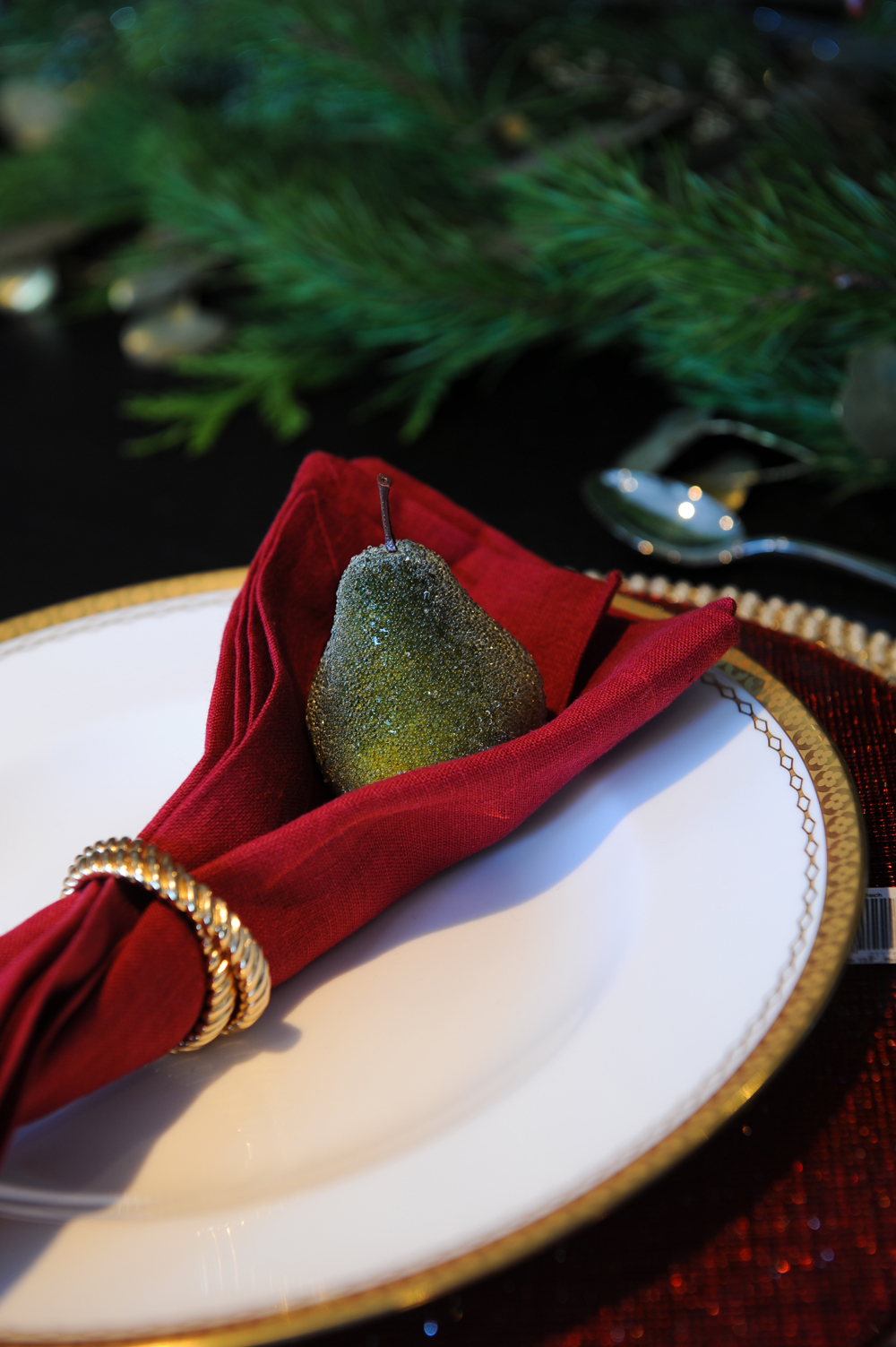 Jeweled pear on a table setting