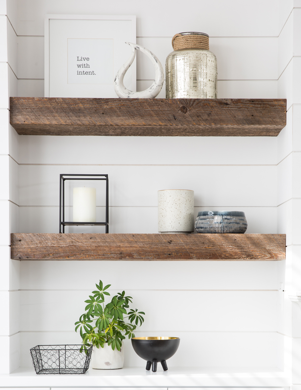 two floating wood shelve on white shiplap wall, 