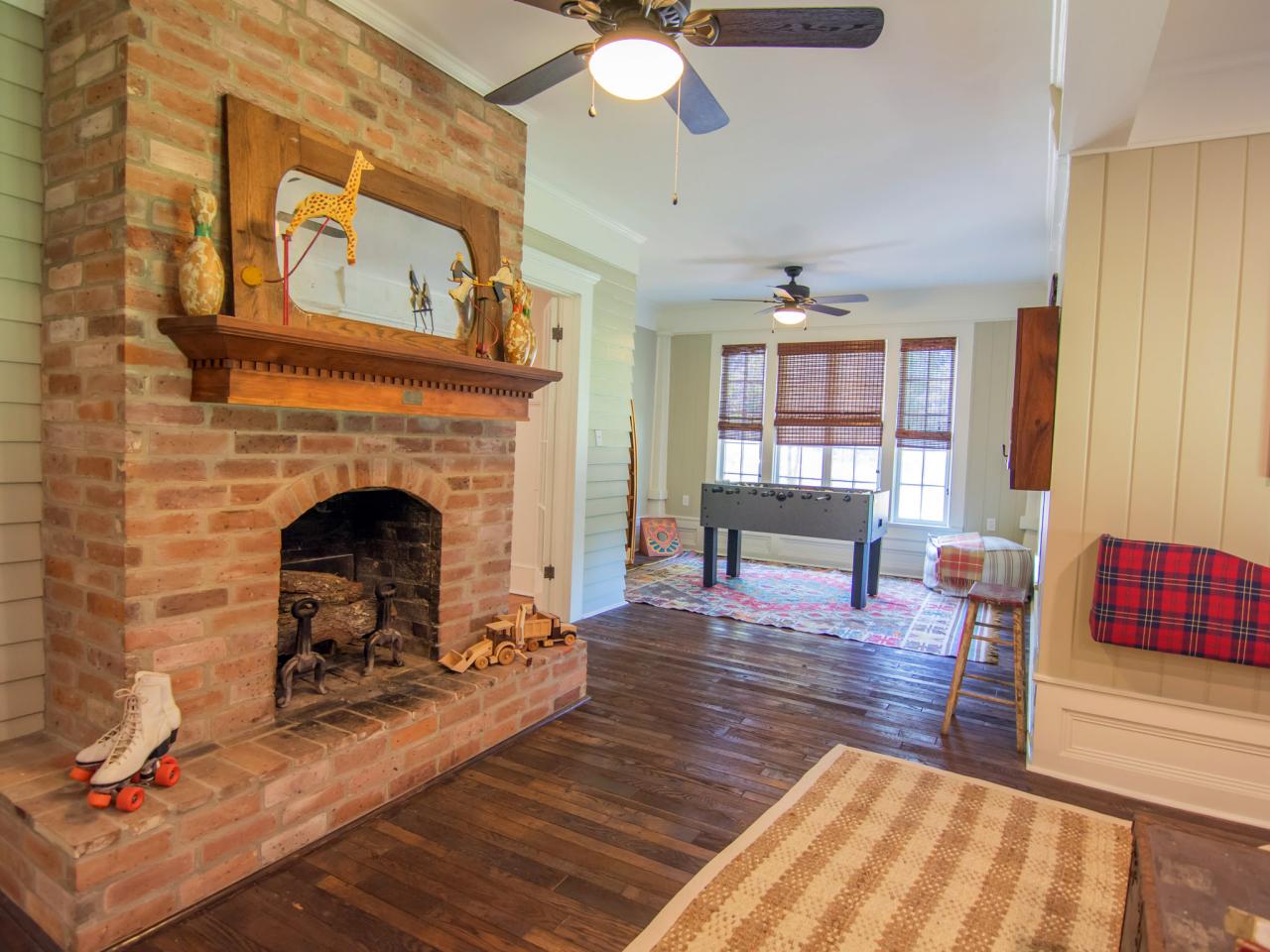 An exposed-brick fireplace.