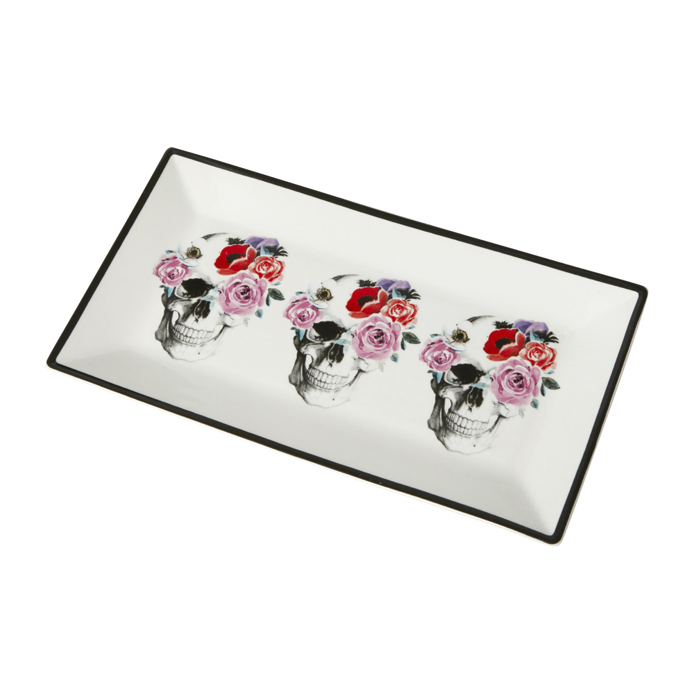 A white and black floral skull serving tray