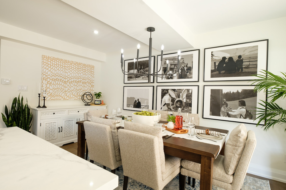 Black and white photo wall in renovated dining room