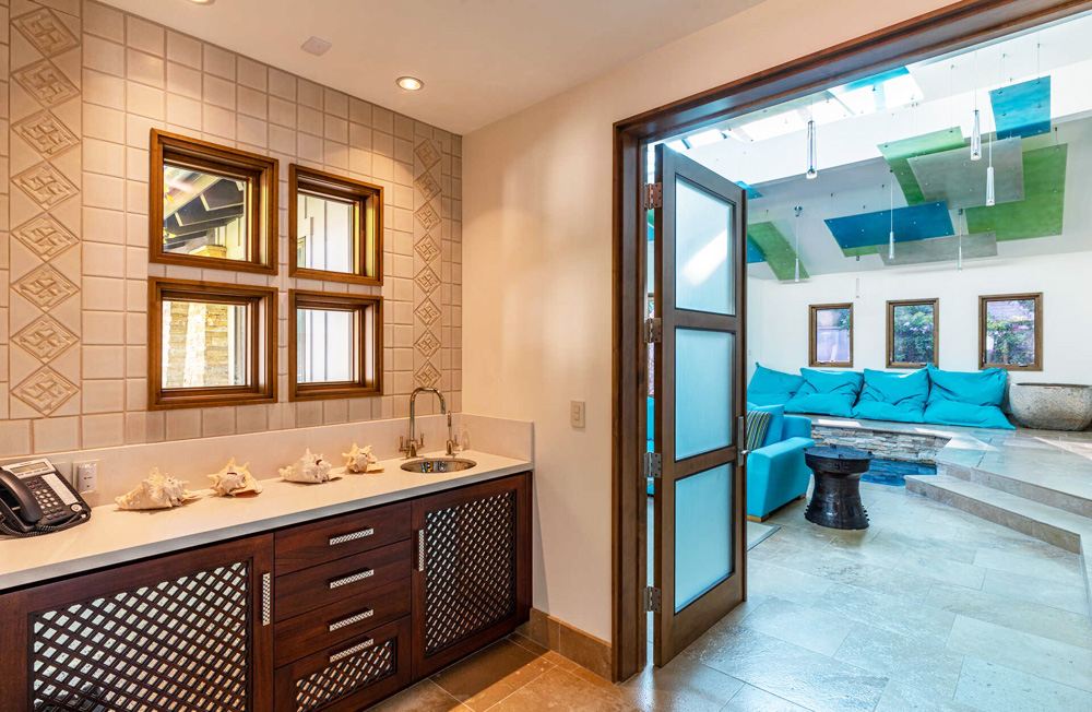 A separate bathroom and change space off to the side of the indoor pool area