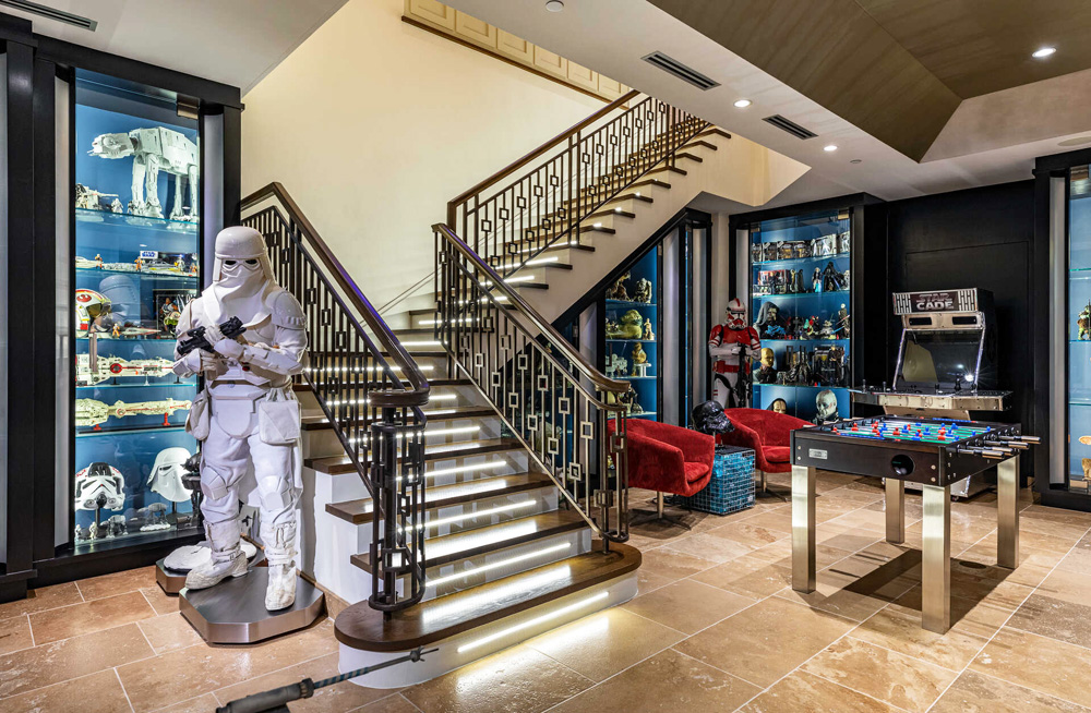 A staircase leading down to the basement that contains thousands of pieces of Star Wars memorabilia