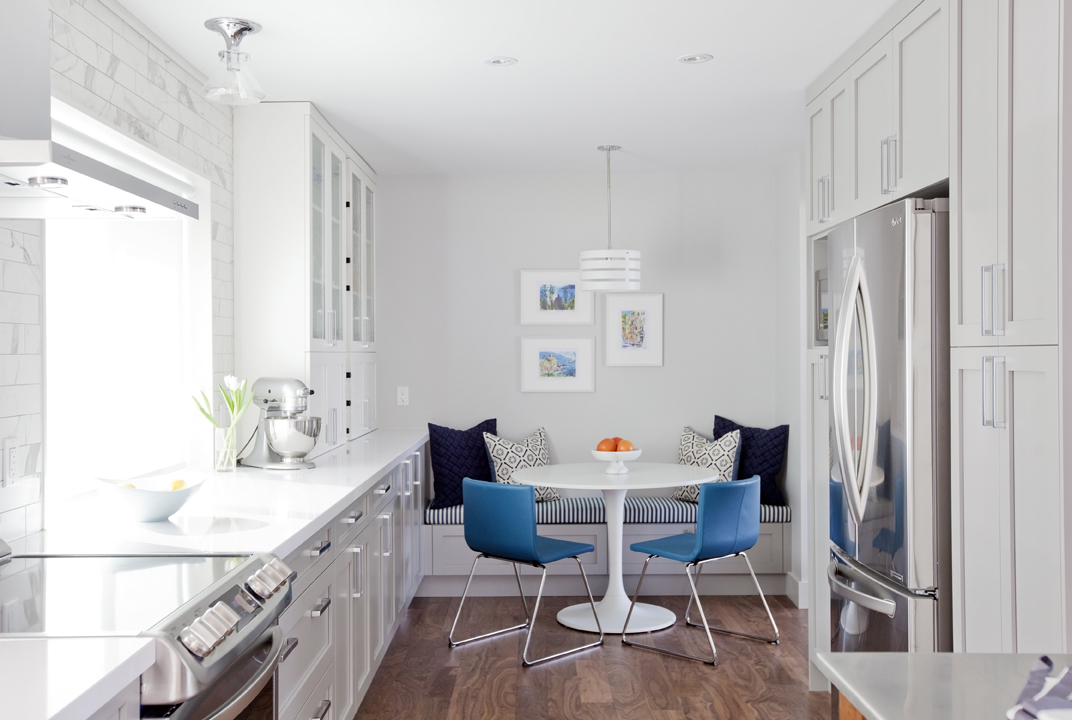 Stylish breakfast nook with bright hits of blue