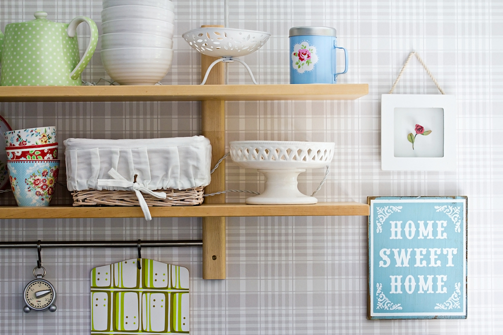 plaid wallpaper and shelves on kitchen wall