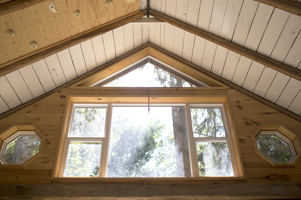 close-up of windows in wood barn cabin
