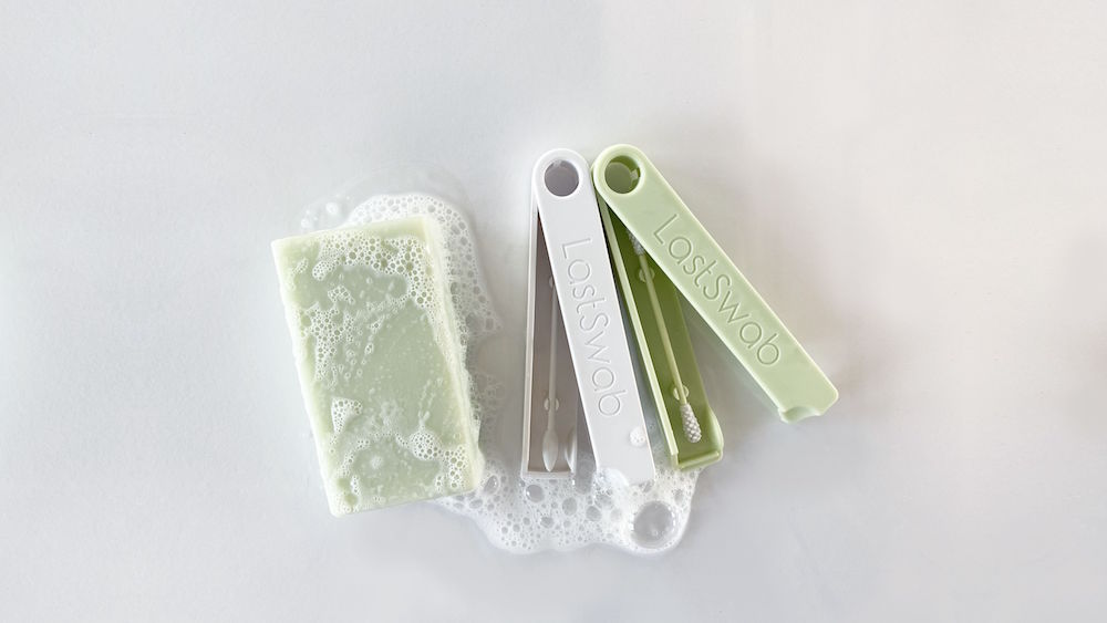 green bar of soap with white and green lastswab reusable swabs