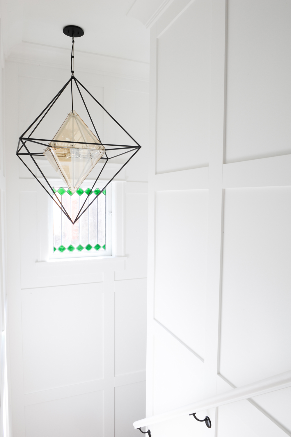 Geometric lighting in a front entryway