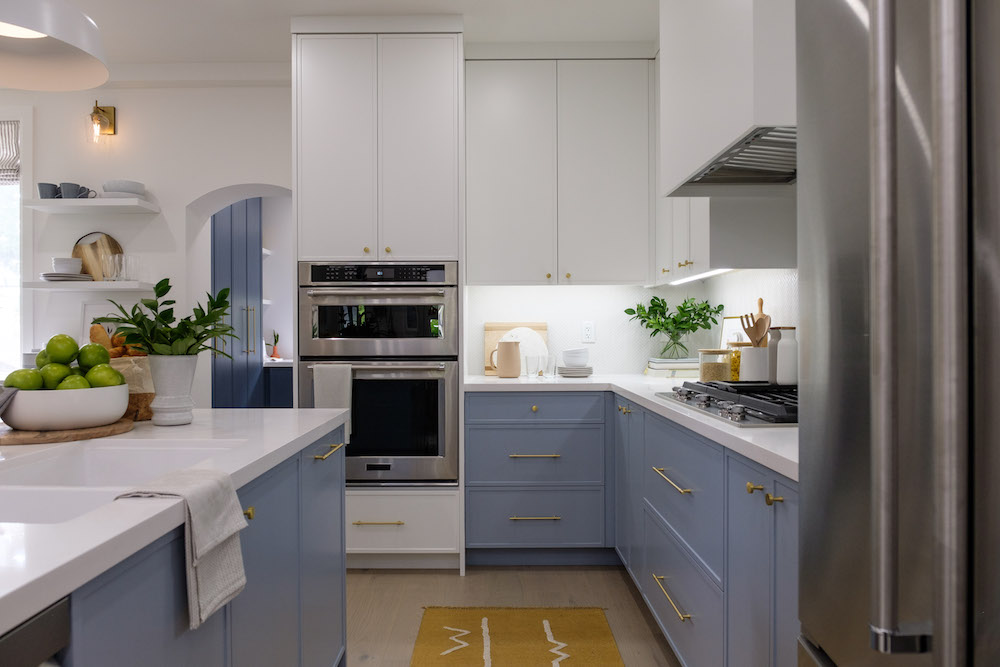 Kitchen with blue and white cupboards