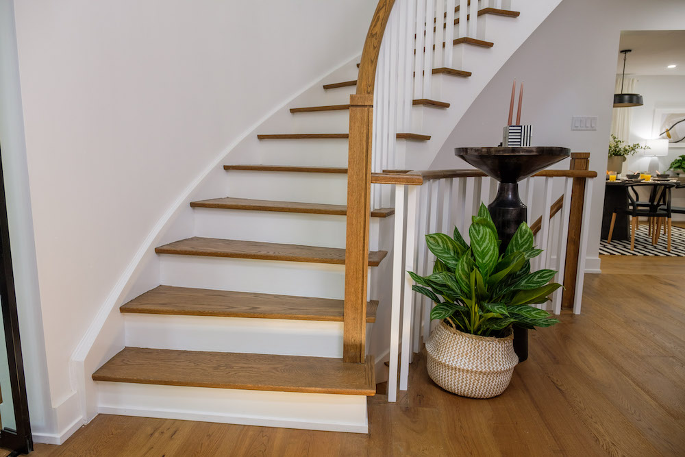 Grand stairs with white spindles