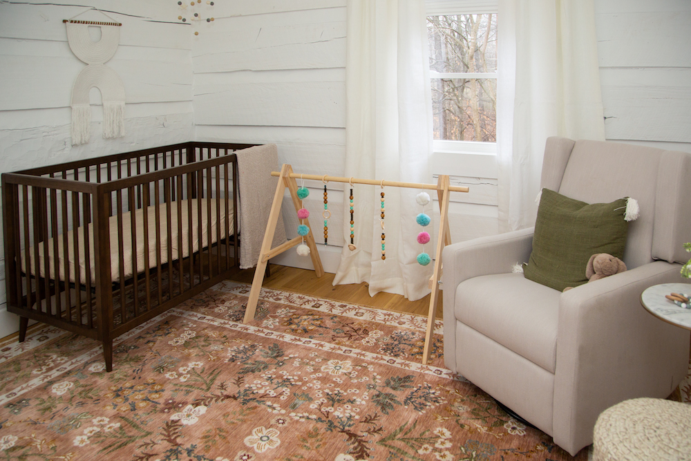 Scandinavian inspired nursery with baby gym