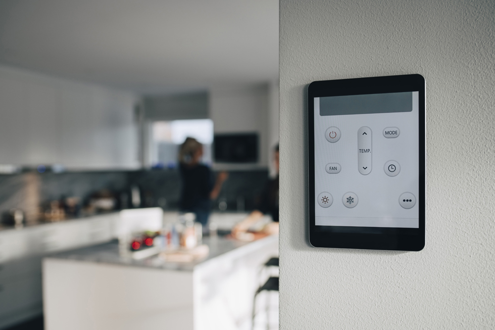 Digital thermostat in a renovated kitchen