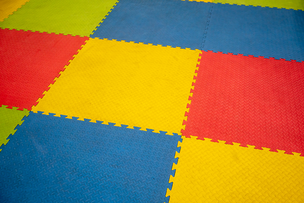 Rubber foam for baby play and childhood background. Colorful Baby Mat.