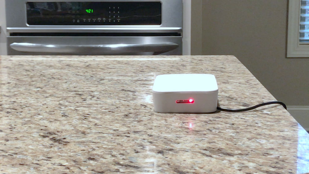 A home control hub on a counter