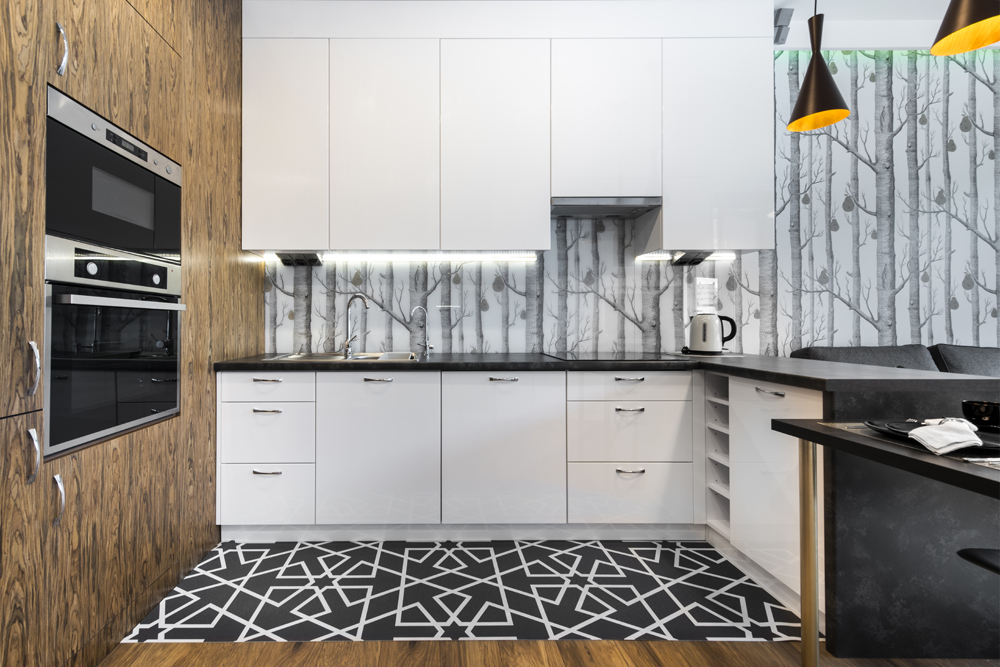 Modern white black and wood kitchen design.