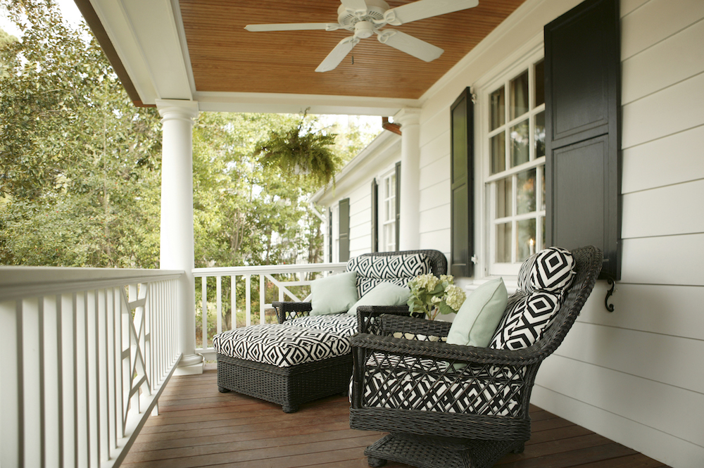 Outdoor covered porch with ceiling fan