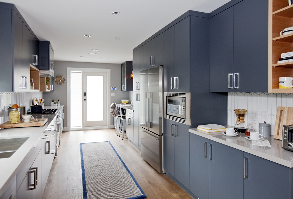 Navy blue kitchen cabinets is an on-trend look that's still timeless.