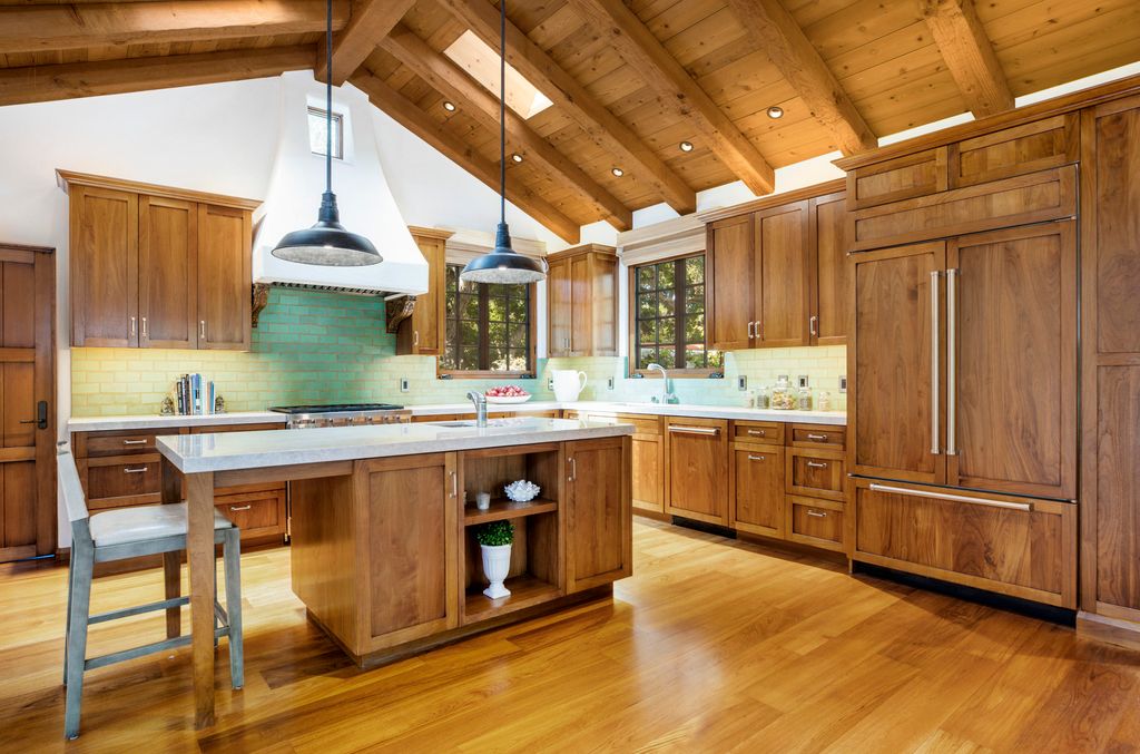 A restored hardwood kitchen in a 100-year-old compound
