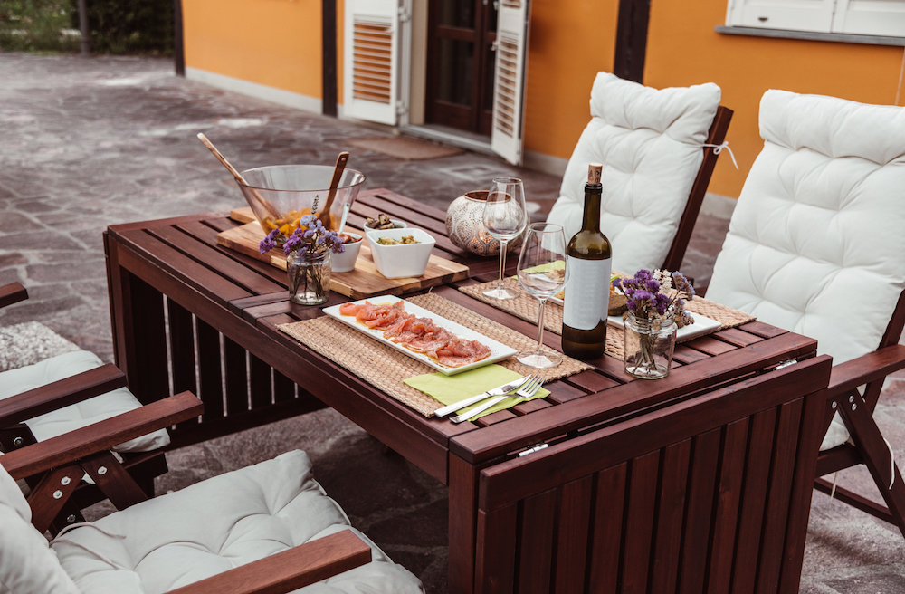 outdoor dining area with folded-down extendable table