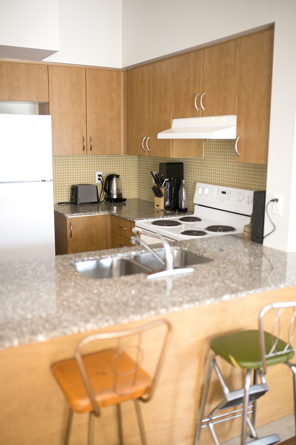 Apartment-sized beige kitchen