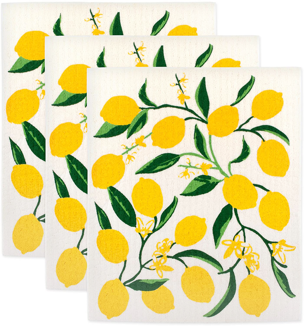 Swedish Dishcloths spread out against a white background in a bold, yellow lemon pattern