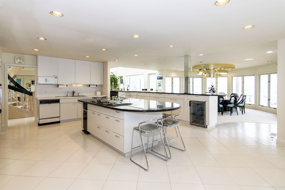 A large, open-concept eat-in kitchen with an island
